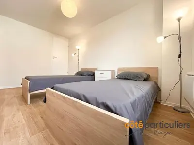 Un ou plusieurs lits dans un hébergement de l'établissement Au Soleil Couchant - Apt T3 à 800m de l'Océan