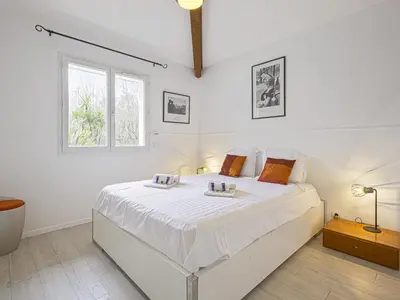 Un ou plusieurs lits dans un hébergement de l'établissement Villa calme avec piscine entre Pays Basque et Sud Landes