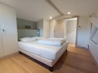 Un ou plusieurs lits dans un hébergement de l'établissement Arcachon le Moulleau maison moderne 3 chambres climatisation - 250m de la plage