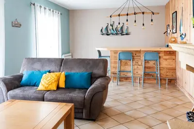 Coin salon dans l'établissement Maison chaleureuse 3* à deux pas de la plage