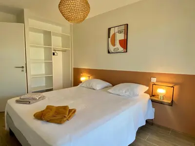 Un ou plusieurs lits dans un hébergement de l'établissement Vue Océan - Au Coeur de Contis Plage