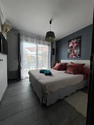Un ou plusieurs lits dans un hébergement de l'établissement Superbe villa 6 personnes proche océan et lac