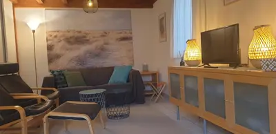 Télévision ou salle de divertissement dans l'établissement Ocelandes