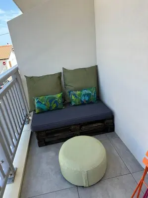 Coin salon dans l'établissement Très bel appartement neuf - Parking et Terrasse