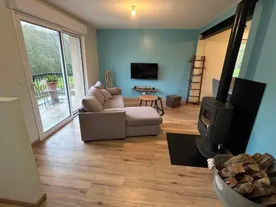 Télévision ou salle de divertissement dans l'établissement Maison de campagne