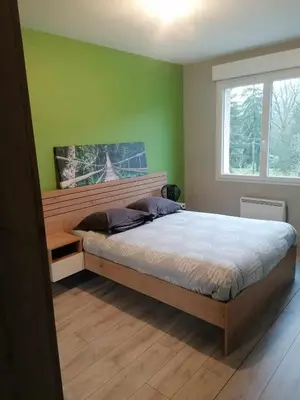 Un ou plusieurs lits dans un hébergement de l'établissement Maison de campagne