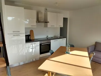 Cuisine ou kitchenette dans l'établissement A louer maison à Mimizan plage chez benoit
