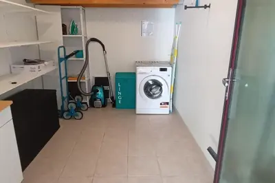 Cuisine ou kitchenette dans l'établissement Appartement de charme T3 avec petit jardin et parking