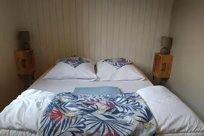 Un ou plusieurs lits dans un hébergement de l'établissement Agréable chalet à Gujan-Mestras