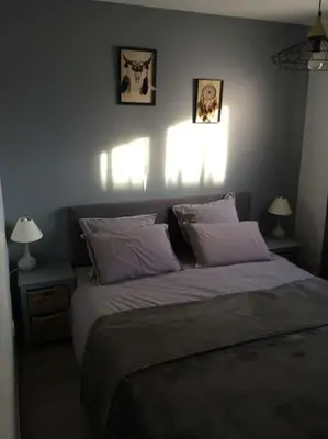 Un ou plusieurs lits dans un hébergement de l'établissement Appartement entièrement rénové avec vue sur océan