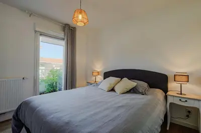 Un ou plusieurs lits dans un hébergement de l'établissement Appartement T2 idéal 2 personnes-150 m de la plage