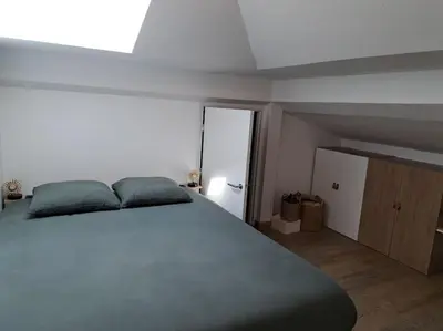 Un ou plusieurs lits dans un hébergement de l'établissement Appartement cosy 2 chambres - 300m de la plage