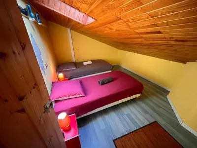 Un ou plusieurs lits dans un hébergement de l'établissement Maisonnette 3 chambres - Confort