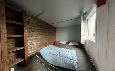 Un ou plusieurs lits dans un hébergement de l'établissement Mobilhome tout confort