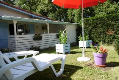 Jardin de l'établissement Appartement charmant à Cassen avec parking inclus – 35 m²