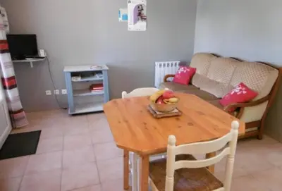 Coin salon dans l'établissement Appartement charmant à Cassen avec parking inclus – 35 m²
