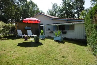 Jardin de l'établissement Appartement charmant à Cassen avec parking inclus – 35 m²