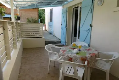 Balcon ou terrasse dans l'établissement Appartement charmant à Cassen avec parking inclus – 35 m²