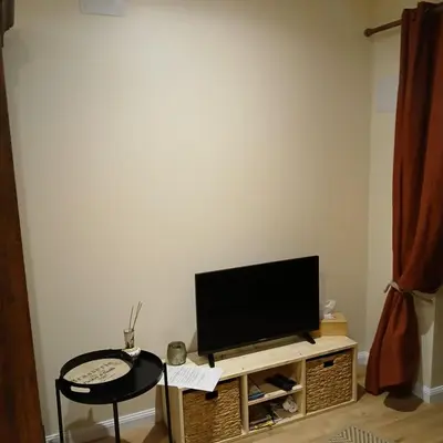 Télévision ou salle de divertissement dans l'établissement Studio au cœur de la nature