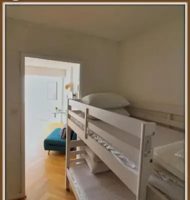 Un ou plusieurs lits dans un hébergement de l'établissement Appartement Biscarrosse plage front de mer 4 personnes