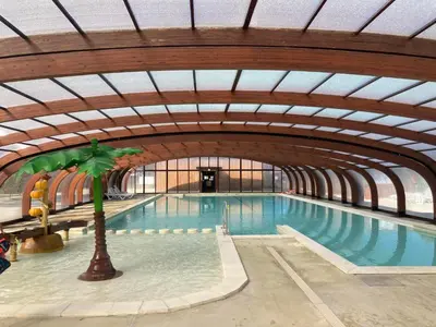 Piscine de l'établissement Chalet en Parc résidentiel pour 4 personnes à proximité de la plage ou située à proximité