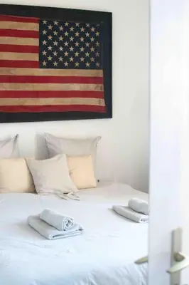 Un ou plusieurs lits dans un hébergement de l'établissement Le Landifornia - Design cosy & horizon bleu avec vue océan