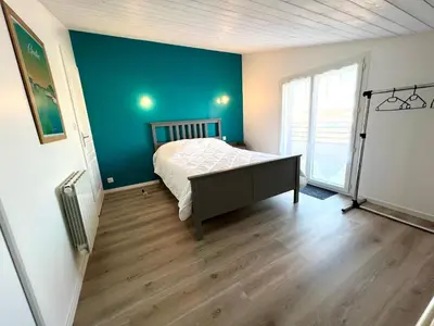 Un ou plusieurs lits dans un hébergement de l'établissement Ô COURANT - T3 terrasse vue océan