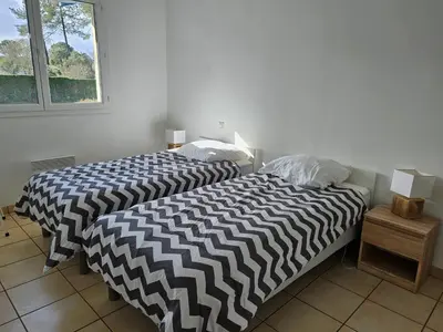 Un ou plusieurs lits dans un hébergement de l'établissement Soustons - Piscine - Famille - Centre Ville