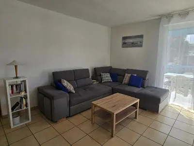 Coin salon dans l'établissement Soustons - Piscine - Famille - Centre Ville