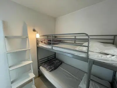 Un ou plusieurs lits dans un hébergement de l'établissement Appartement 4 pers belle terrasse vue port