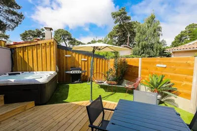 Jardin de l'établissement Appartement plage à pied