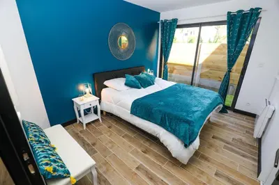 Un ou plusieurs lits dans un hébergement de l'établissement Appartement plage à pied