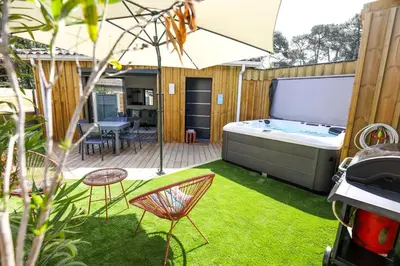 Jardin de l'établissement Appartement plage à pied