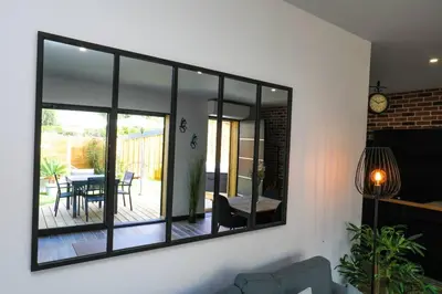 Coin salon dans l'établissement Appartement plage à pied