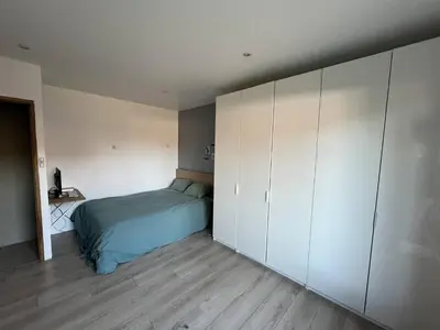 Un ou plusieurs lits dans un hébergement de l'établissement Villa OHANA pour 8 personnes avec piscine et cuisine d'été. Wifi gratuit