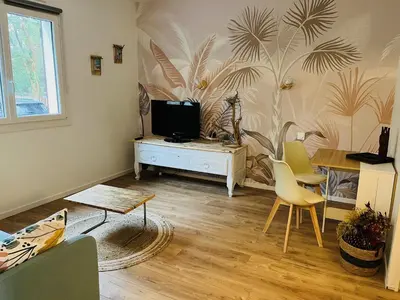 Télévision ou salle de divertissement dans l'établissement Chambre d'Hôtes du Lac
