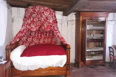 Un ou plusieurs lits dans un hébergement de l'établissement Gîte avec jardin tout confort à Luglon, proche Ecomusée de Marqueze, Landes