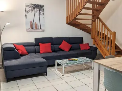 Coin salon dans l'établissement La gemmeuse Meublé de tourisme 3 étoiles