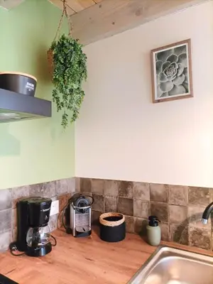 Cuisine ou kitchenette dans l'établissement Havre de Paix 40