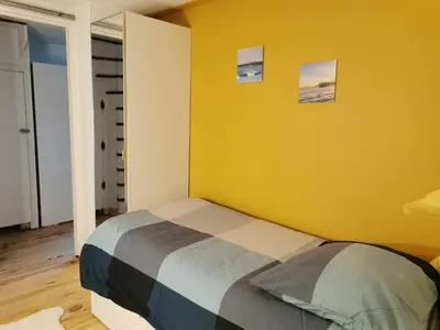 Un ou plusieurs lits dans un hébergement de l'établissement la maison du bonheur
