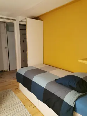 Un ou plusieurs lits dans un hébergement de l'établissement la maison du bonheur