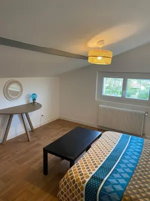 Un ou plusieurs lits dans un hébergement de l'établissement Maison Mont de Marsan