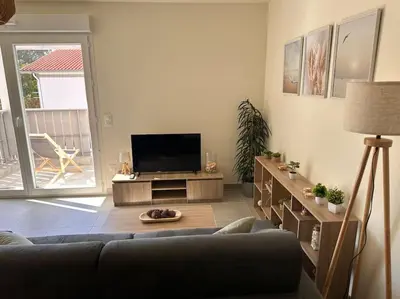 Télévision ou salle de divertissement dans l'établissement A 600m de la plage - Le Nature -