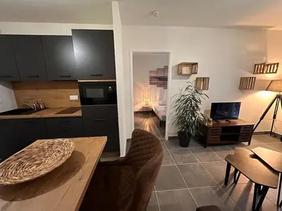 Cuisine ou kitchenette dans l'établissement A 600m de la plage - Le Cosy -