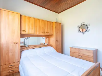 Un ou plusieurs lits dans un hébergement de l'établissement Maison 3 chambres proche plages avec jardin clos à Mimizan - pour 8 personnes - FR-1-50-127