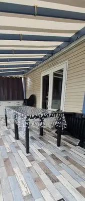 Plan de l'établissement Mobil home 693 à la réserve 8 personnes avec terrasse couverte