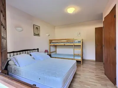 Un ou plusieurs lits dans un hébergement de l'établissement Appartement T2 Nord Est à 300m des plages