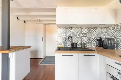 Cuisine ou kitchenette dans l'établissement charmant Studio mezzanine