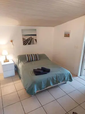 Un ou plusieurs lits dans un hébergement de l'établissement chalet la rose des sables