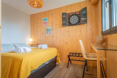 Un ou plusieurs lits dans un hébergement de l'établissement Comme Un Petit Chalet